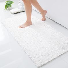 PRICES MAY VARY. 【SUPER SOFT & SHAGGY】Luxury bathroom rugs are soft and comfortable to the touch, offering exceptional comfort and support for your feet. The soft pile soothes your tired foot and shields toes from the cold floor. 0.94 inches height fluffy and soft microfiber fibers, unique fiber-locking technique, softer, thicker and better constructed than Regular Chenille. Every time you step out of the shower or bathtub, you can enjoy comfort like stepping into the cloud. 【QUICK WATER ABSORPT