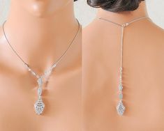 the back of a woman's head wearing a diamond necklace and earring set