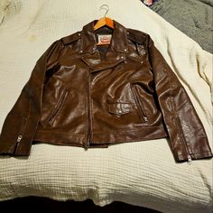 Beautiful Light Weight Faux Leather Authentic Levi's Motorcycle Jacket. Xl Was Never Worn. L Worn Once. Color Brown. Retro Brown Outerwear With Zipper Closure, Levi's Fitted Long Sleeve Leather Jacket, Levi's Biker Outerwear For Winter, Levi's Biker Style Winter Outerwear, Levi's Long Sleeve Leather Jacket For Fall, Levi's Retro Long Sleeve Outerwear, Retro Levi's Long Sleeve Outerwear, Retro Long Sleeve Levi's Outerwear, Levi's Fitted Biker Outerwear