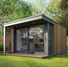 a small garden office with sliding glass doors