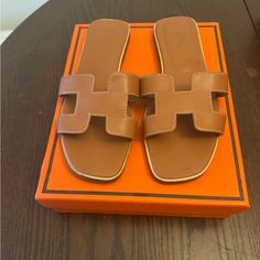 Hermes Women’s Sandals In Brown Size 40 Gently Used Luxury Tan Open Toe Sandals, Luxury Tan Flat Heel Sandals, Elegant Tan Sandals For Vacation, Hermes Shoes Women, Hermes Women, Hermes Sandals, Hermes Shoes, Shoes Women, Women's Shoes Sandals