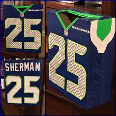 there are two football jerseys on display in the store, one is blue and green