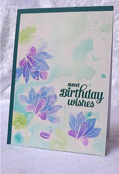 a handmade birthday card with watercolor flowers and the words, sweet birthday wishes