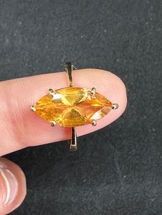 Natural stone: Citrine Gemstone  Shape: ✩ Marquise shape ✩ Dimensions: 15.9 x 7.9 x 5.8 mm Ring Size: US size No. 6 Natural stone: 3.52 carats (with engraving) Material: Yellow gold 14k (with engraving) Total weight: 3.35 g Please note that there may be a color difference between the image and the actual product. G Ring, Ring Marquise, Citrine Ring, Natural Citrine, Citrine Gemstone, Etsy Jewelry, Solitaire Ring, Citrine, Natural Stones