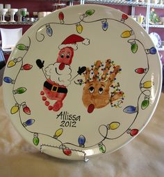 a plate with a santa clause and reindeer on it