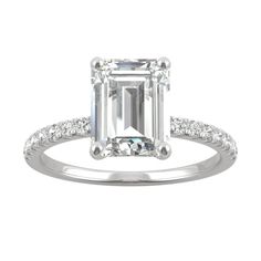 an emerald cut diamond engagement ring with side stones