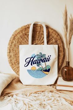 This 100% cotton bag comes in one size - 15" x 16"- perfect for everyday wear. The tote features 20" handles (made from the same canvas), making it easy to carry even with a week's worth of shopping. Key Features: * Durable 100% natural cotton canvas fabric * 2-sided print * One size: 15x16" * Self-fabric carrying handles with reinforced stitching Care Instructions: * Tumble dry: low heat; Non-chlorine: bleach as needed; Do not iron directly over the printed area - print may stick to the iron.; Summer Cotton Shoulder Bag For Travel, Vacation Canvas Shoulder Bag, Cotton Beach Bags For Daily Use, Cotton Tote Shoulder Bag For Beach Season, Trendy Cotton Bags For Vacation, Cotton Shoulder Bag For Daily Use At Beach Season, Casual Canvas Bag For Vacation, Cotton Shoulder Bag For Beach Vacation, Casual Canvas Bag With Letter Print For Vacation