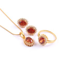 This Sterling Silver Jewelry set features an Elegant Art With Natural Hessonite Gemstone. The cavity is made from genuine solid 925/92.5 Sterling silver with 18k Gold Plating and stamped as S925. This Jewelry is Lead free. ITEM DESCRIPTION Item Code: JACBS1/45 Metal: 18k Gold / Rose Gold Plated over 925/92.5 Sterling Silver Gemstone: Genuine Natural Hessonite Gemstone Shape: Oval Gemstone Size: 6 X 8 MM Ring Dimension:- Length: 12 MM Width: 11 MM Weight: 3.93 gm approx Earrings Dimension:- Lengt Formal Round Gemstone Jewelry Sets, Elegant Gemstone Gold-plated Jewelry Sets, Classic Round Gemstone Jewelry Sets, Elegant Amber Jewelry With Polished Finish, Fine Jewelry Sets With Gemstones For Anniversary, Fine Jewelry With Plating For Formal Occasions, Oval Gemstone Jewelry Sets For Formal Occasions, Yellow Gold Cubic Zirconia Jewelry Sets, Formal Gold Plated Jewelry With Prong Setting