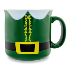 a green and white coffee mug with an elf's hat on it