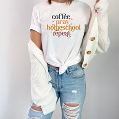 Hey there, homeschool mamas! 🌟 The "Coffee Pray Homeschool Repeat" t-shirt is here to add a touch of positivity and motivation to your daily routine! This charming t-shirt pairs effortlessly with your favorite jeans or leggings. The design showcases the mantra of every homeschool mom - juggling coffee, prayers, and the wonderful chaos of homeschooling! The fit is relaxed and comfortable, perfect for those busy days filled with lesson plans and laughter. ----------------------------------------- Casual T-shirt With Letter Print, White Tops For Everyday Back-to-school Wear, White Tops For Everyday Back To School, Casual Letter Print T-shirt, White School Spirit T-shirt For Everyday, Homeschool Svg, Homeschool Shirt Ideas, Homeschool Mom Shirts, Homeschool Mom Svg Free