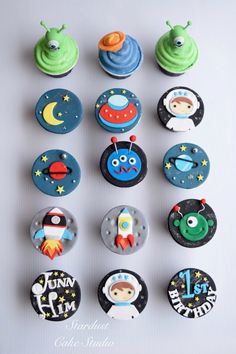 cupcakes decorated with space themed fondant