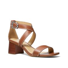 Michael Kors-Ashton Sandal Elevate a summery look in the Ashton sandal from Michael Michael Kors. This crisscross-strapped pair sports a recycled construction crafted from LWG-rated leather for a sustainable highlight. Construction Crafts, Active Wear Outfits, Athletic Fashion, Athletic Sneakers, Mens Activewear, Leather Upper, Active Wear, Michael Kors, Sandals