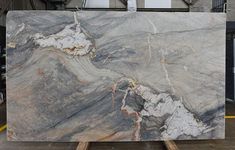 a large marble slab sitting on top of a wooden pallet