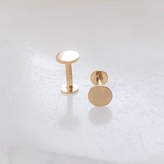 "* FREE SHIPPING * These flat back studs are easy to wear and so comfortable! * T H E * D E T A I L S * * All components are solid 14k gold * Post measures 18g and 6mm long * Choose from 3mm or 4mm stud size * Thoughtfully packaged & ready for gift giving! * Handmade, just for you, in our sunny California Studio * Our 365 Guarantee: Our jewelry is guaranteed for 1 year after purchase date against defects. * Your earrings are sent in a gloss white jewelry box & our signature \"Studio Blue\" satin Gold Post Earrings, Flat Earrings Stud, Gold Nap Earrings, Flat Earring Backs, Earrings With Flat Backs, Flat Stud Earrings, Flat Back Earrings Gold, Flat Back Earring, Flat Backed Earrings