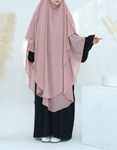 Discover the elegance of this extra-long, two-layer chiffon hijab. Designed for a perfect fit, it’s versatile enough for any occasion, offering both comfort and style. Crafted with quality materials by Annah Hariri, this timeless piece is a sophisticated addition to any wardrobe. Please note, the dress in images is not included. Enjoy this elegant khimar for years to come, whether for special events or daily wear. Annah Hariri, Khimar Hijab, Chiffon Hijab, Extra Long, Timeless Pieces, Special Events, Daily Wear, The Dress, Special Occasion