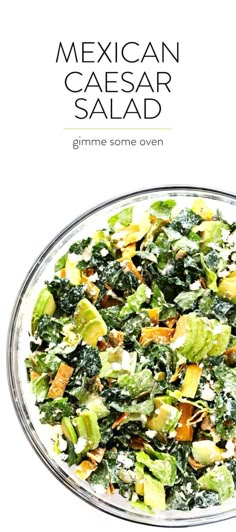 mexican caesar salad with avocado, cheese and lettuce in a glass bowl