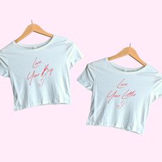 A love letter to your future little in T-shirt Form <3 -Sold separately -Baby tee comes in black or white -52% combed ring-spun cotton, 48% polyester  -Made to order (ships in 2-5 business days) -If EXPRESS shipping is requested, please include your phone number as a note in your order! Thank you!! :) Fitted Family Matching Tops With Name Print, Graphic Tee With Slogan As A Gift, Fitted Crew Neck Top For Family Matching, Graphic Tee With Slogan As Gift, Matching Short Sleeve Letter Print T-shirt, Family Matching Short Sleeve Tops With Letter Print, Short Sleeve Slogan Tops As Gifts, Family Matching Tops With Letter Print And Short Sleeves, Short Sleeve T-shirt With Text Print