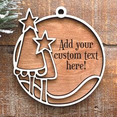 a wooden ornament with a christmas tree and star on it that says add your custom text here