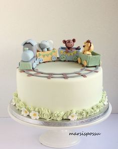 there is a cake that has animals on it