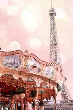 the eiffel tower in paris, france is painted pink and white with lots of lights