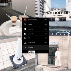 a woman standing in front of a building next to a coffee cup on top of a table