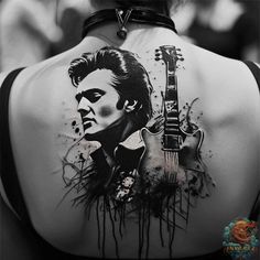 the back of a woman's neck with an elvis presley tattoo design on it