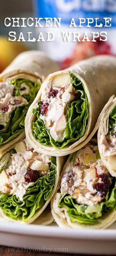 chicken apple salad wraps on a white plate