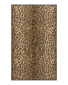 an animal print rug on a white background