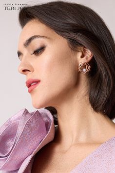 Nothing short of unique and stunning, these rose gold-plated drop earrings will elevate any look. The intertwining of circular branches hold blue lace agate cabochons. To be worn for both casual and formal affairs. Color: Rose Gold Weave Design with Rose Gold Plated Stone Push Back Closure Modern Rose Gold Evening Earrings, Modern Rose Gold Earrings For Evening, Chic Rose Gold Earrings For Formal Occasions, Chic Rose Gold Jewelry For Evening, Feminine Rose Gold Jewelry For Evening, Feminine Rose Gold Evening Jewelry, Rose Gold Studs, Blue Lace Agate, Lace Agate