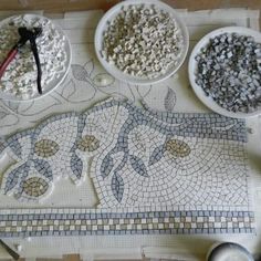 three bowls filled with different types of rocks