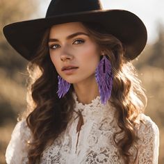 Elevate your style with these exquisite Triple Layered Leather Earrings! Crafted using lightweight and soft leather that are adorned with orange colored multifaceted crystal beads that shimmer in the sunlight. The leather is sourced from an indigenous family-owned business called Tribal Spirit in Canada that creates beautiful deer hides and adds a touch of authenticity and heritage to each pair of earrings.  Elevate your jewelry collection with these handcrafted treasures! Bohemian Earrings For Evening, Bohemian Evening Earrings, Purple Bohemian Chandelier Earrings For Party, Bohemian Purple Chandelier Earrings For Party, Bohemian Fringe Earrings For Evening, Elegant Purple Earrings For Festival, Elegant Feather Earrings For Festival, Bohemian Adjustable Chandelier Earrings For Parties, Adjustable Bohemian Chandelier Earrings For Party