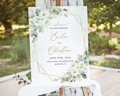 an easel with a sign that says welcome to the bride and groom