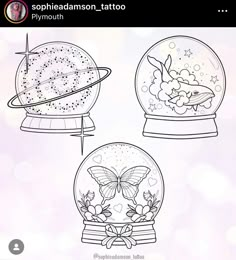 three snow globes with butterflies in them and stars on the top, one has a butterfly