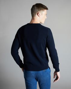 DESCRIPTIONThis V-neck men's sweater is crafted from plain knitted Kid Cashmere, an extremely fine and soft fibre, obtained exclusively from the undercoat of the Hircus goat kids. The sweater features a neckline trim with an original zigzag pattern. Its precious and exclusive yarn makes this garment the luxury version of an essential knitwear item.FABRICSThe Kid Cashmere yarn is obtained from the undercoat of Hircus goats kids. The natural molt allows to harvest this precious, exclusive and ultr Goat Kidding, Zigzag Pattern, Cashmere Yarn, Zig Zag Pattern, Men's Wardrobe, V Neck Sweater, Men's Sweater, Zig Zag, Blue Man