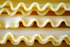 close up view of some type of pastry with white icing on it's edges