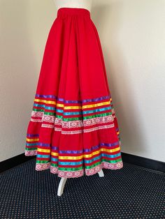 Hand Made Folklorico skirts for toddlers, youth and adults Poly-Cotton Poplin (Popelina) Skirts may used for dance competitions, themed Fiestas, etc. Different lengths available 23 inches, 25 inches, 27 inches, 31 (80 cm) inches, 35 (90 cm)inches and 39 (100 cm) inches Ribbon colors may vary by skirt. If you need them to match, please let us know and we will do our best to accommodate you. 6 ribbons and two layers of lace Waist: One size fits most, one inch wide belt with long straps (long enoug Seminole Patchwork, Dance Competitions, Ribbon Skirt, Skirt Inspiration, Native American Clothing, Mexican Blouse, Custom Printed Mugs, Ribbon Skirts, Ribbon Dress