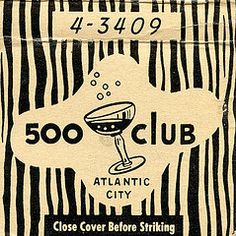 the 500 club atlantic city coaster is made out of zebra - print paper and has a martini glass on it