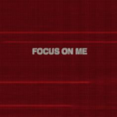 the words focus on me are displayed against a red background with white letters and lines