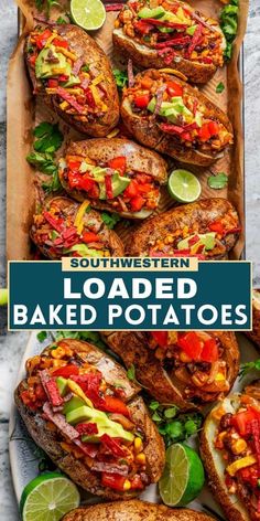 loaded baked potatoes on a platter with limes, tomatoes and other toppings