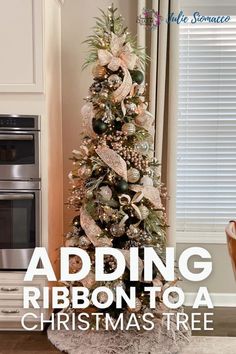 a christmas tree with gold and silver ornaments on it in front of a stove top oven