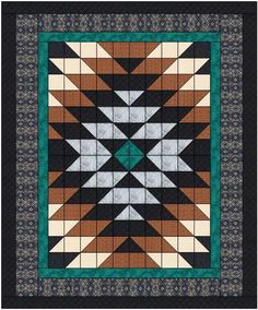 a black and brown quilt with an intricate design