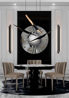 a large clock mounted to the side of a wall above a table with four chairs