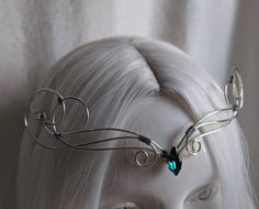 A beautiful, intricate elven inspired choker with a unique feature: this piece can be converted into a tiara! Eyes will follow the delicate swirls with a crystal centerpiece as it decorates your neck or forehead, perfect for renaissance fairs, weddings, cosplay, or any event of your choosing! The choker is 14 inches plus 1.5 inch extension chain The tiara is 21 inches plus a 4 inch extension chain If you need any other sizes, please feel free to message me! Choose from oval, teardrop or horse ey Fantasy Crown Shape Jewelry For Gifts, Silver Fantasy Crown Headpiece, Fantasy Crown Jewelry For Party, Fantasy Crown Jewelry For Gifts, Fantasy Crown-shaped Jewelry Gift, Elegant Adjustable Jewelry For Masquerade, Adjustable Silver Jewelry For Masquerade, Adjustable Silver Elven Jewelry, Handmade Fantasy Crown Jewelry