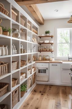 Transforming your kitchen pantry into a farmhouse-style haven isn't just about utility but creating a space that exudes charm and warmth. Imagine the elegance Open Pantry Shelves Kitchen, Rack With Baskets, Butlers Pantry Styling, Open Pantry In Kitchen, Pantry Built In Shelves, Simple Butlers Pantry, Butlers Pantry Organization, Beadboard Pantry, Prep Kitchen Pantry