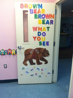 a door decorated to look like a bear with the words brown bear what do you see?