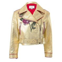 Gold leather short biker jacket from Gucci.Asymmetrical zip front closureTwo front zip pocketsRed pipingBelt loops with matching removable belt at waistZip cuffsSequin front and back embellishementsRed fabric linedItem fits true to size.100% leatherSpecialist cleaning.Made in Italy Gucci Designer Leather Outerwear, Designer Gucci Leather Outerwear, Designer Leather Gucci Outerwear, Gucci Fitted Leather Jacket For Fall, Designer Gucci Leather Jacket With Long Sleeves, Designer Biker Jacket With Zipper For Spring, Designer Biker Jacket With Zipper Closure For Spring, Designer Gucci Long Sleeve Leather Jacket, Designer Long Sleeve Gucci Leather Jacket