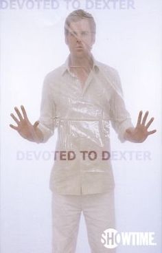 a man in white shirt and pants standing with his hands out to the side while wearing clear plastic