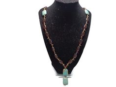 This necklace is made of turquoise rectangular beads and deep orange glass beads that match the veins on the turquoise. It measures 30 inches long by .25 inches wide. The pendant measures .5 inches wide by 2 inches long. There is a tiny loop at the bottom of the pendant to which you can hang a stone or bauble of your choice, or leave it as is. Bohemian Brown Rectangular Necklace, Handmade Rectangular Turquoise Necklace, Bohemian Turquoise Rectangular Necklace, Turquoise Rectangular Adjustable Necklace, Adjustable Rectangular Turquoise Necklace, Pewter Pendant, Deep Orange, 90s Mens, White Stain