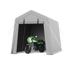 a motorcycle is parked in a small shelter