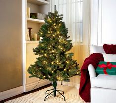 a small christmas tree in a living room